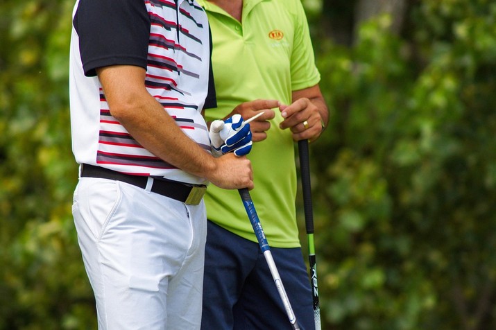 Two Golfers Talking on Course